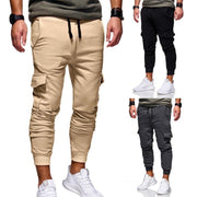 men sport sweatpants jogger pants with elastic waist and side buttons, styled for a casual streetwear look.
